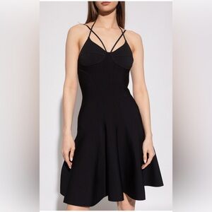 Alexander McQueen White Label with Black Text and Red Line